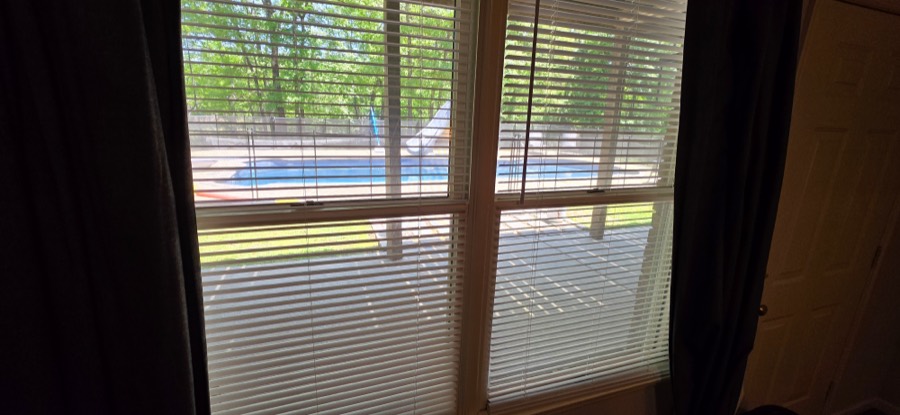 View of patio and pool from the suite bedroom